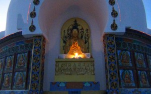 Buddha statue within Shanti Stupa
